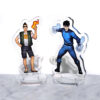Two Acrylic standees - one of Kenji and one of sunshine - about two inches tall stand side by side on a marble floor against a white background.